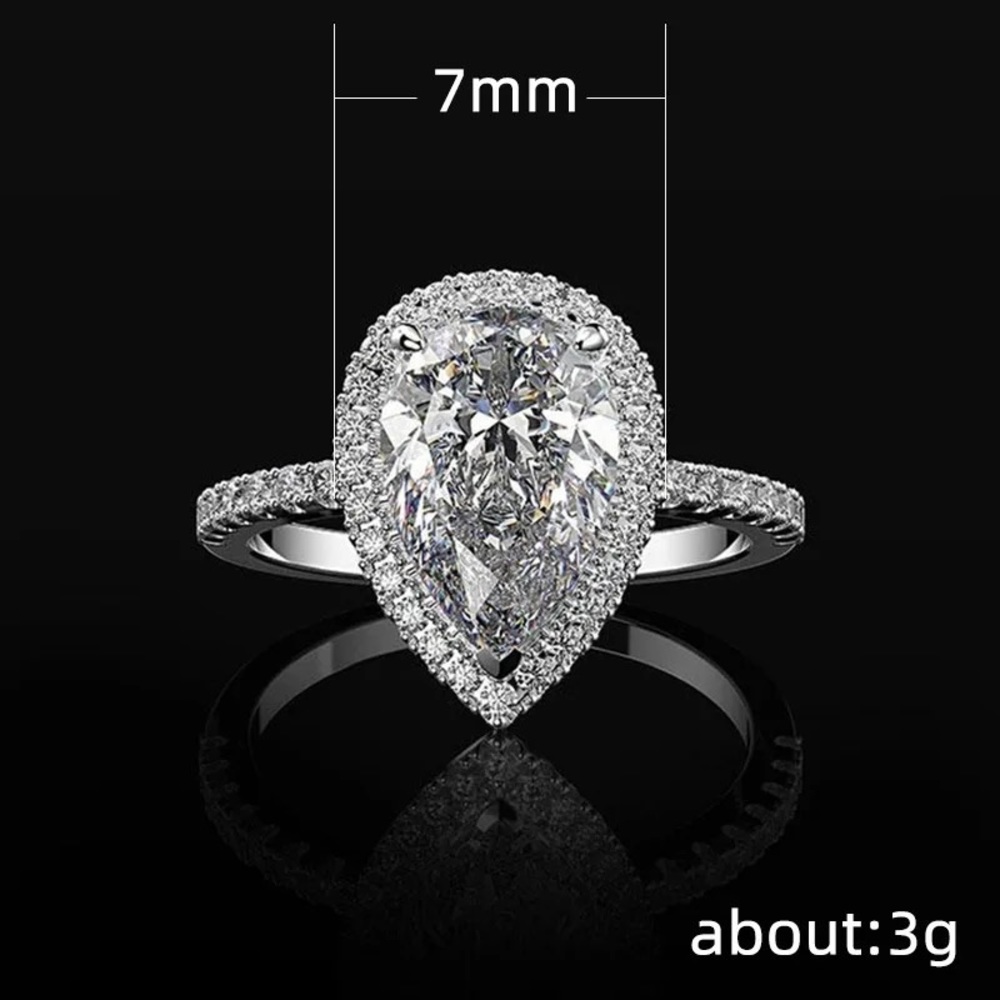 Silver Diamond Ring with Pavé and Halo Setting